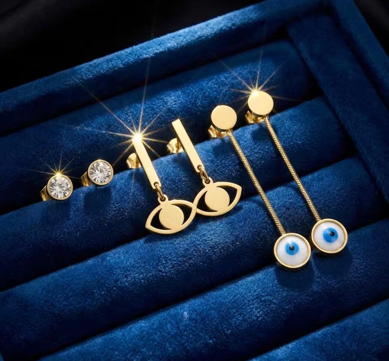 Set de 3 Pares de Aretes Dorados con Zirconia, Ojo Turco y Diseño Geométrico – Elegancia para Mujer